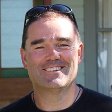<i class='fa fa-info-circle fa-lg'></i><span> About Norman</span> Photo of Norman Hadfield